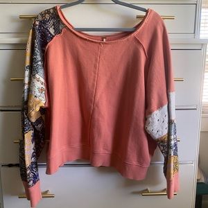 pink cropped fun long sleeve top.